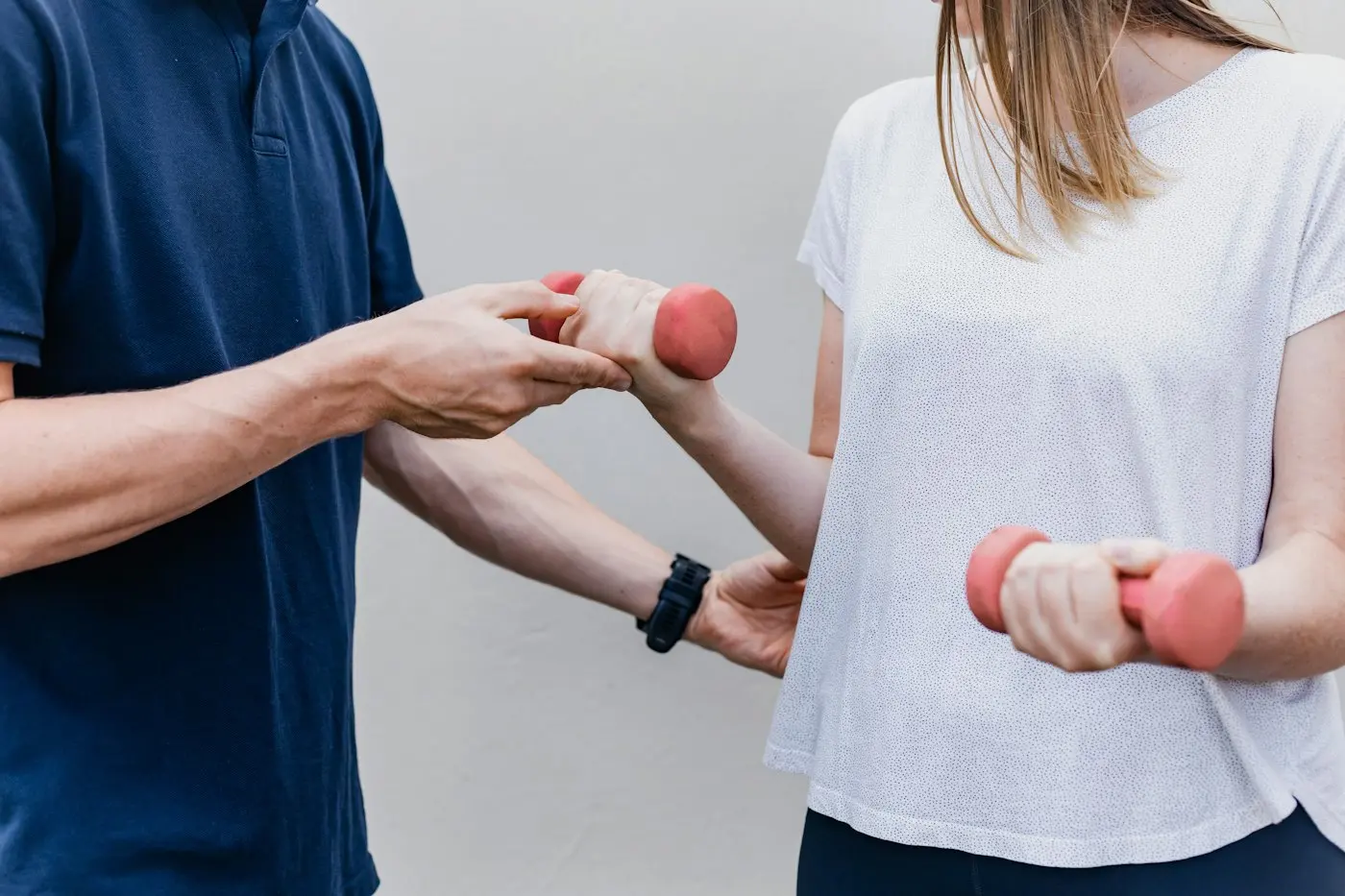 Physiotherapist helping a patient exercise